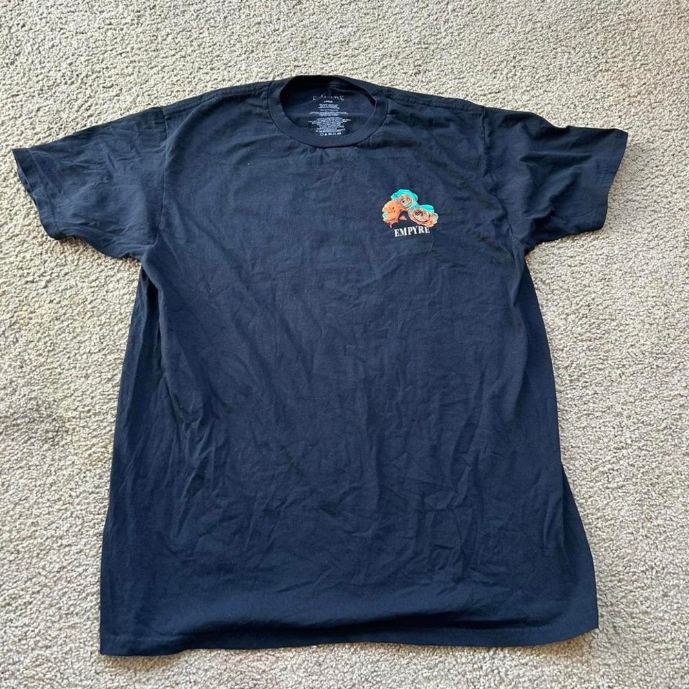 Black Empyre tee with multi-coloured design
